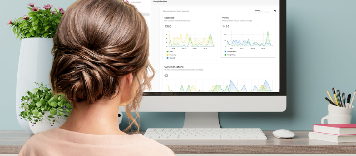 business owner reviewing over Google Business Insights dashboard
